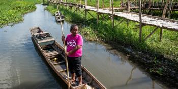 Man in VSO t shirt in boat