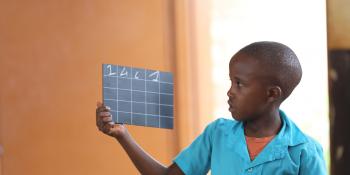 Child with chalkboard