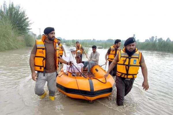 Flood rescue team pulls people to safety