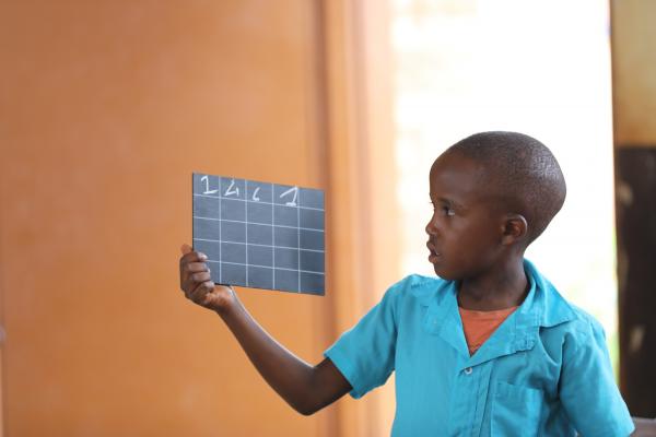 Child with chalkboard