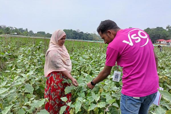 Volunteer with farmer